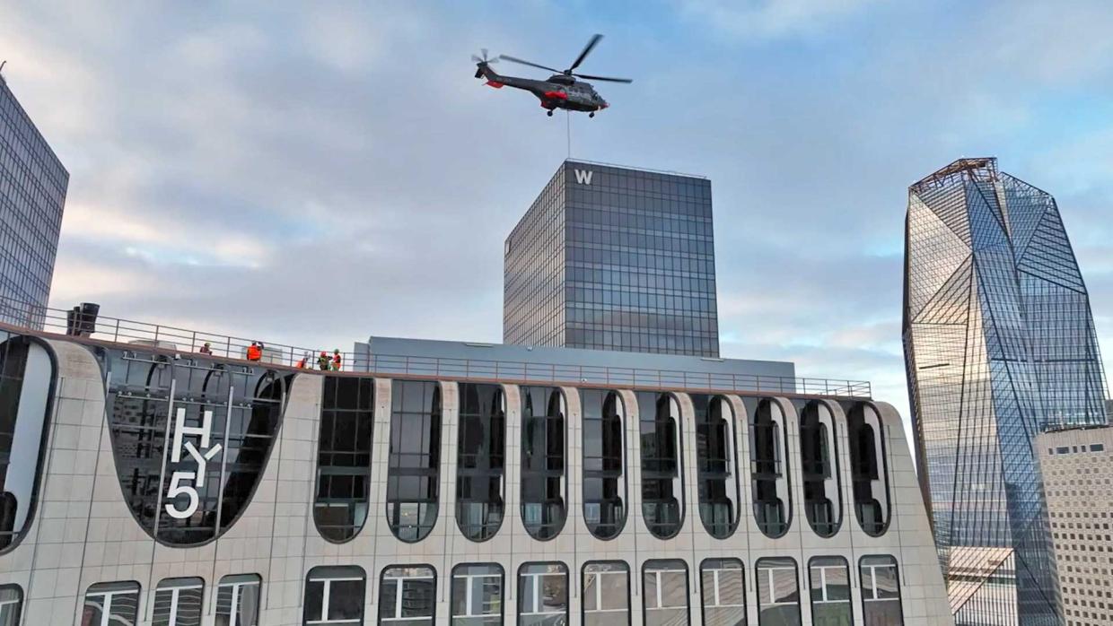 Helicopter Transport of Heat Pumps to the Top of a Tower in Paris