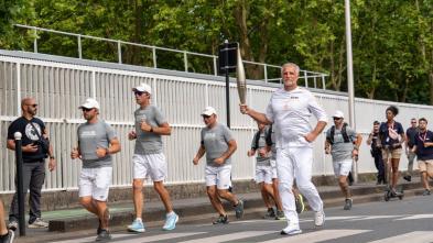 Our CEO Pascal Bovis carries the Olympic flame